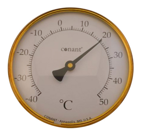 Rundt termometer i messing