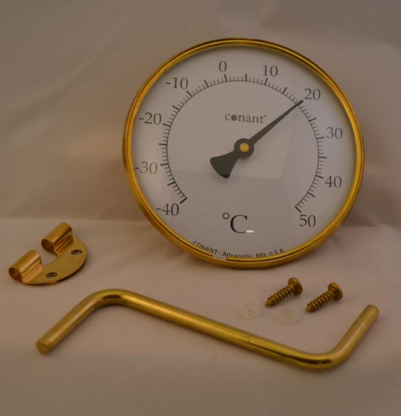 Rundt termometer i messing